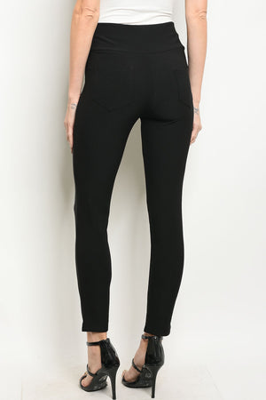 Black Skinny Leg Pants With Elastic Waist. Has gold buttons and detail on the front.