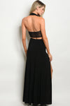 Maxi Black Skirt With A Crop Top. Right side of skirt has a split up to the hip. Crisscross straps across the chest